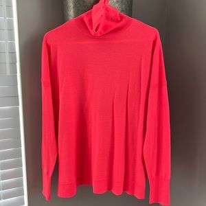 Orange j crew turtleneck sweater. Size medium